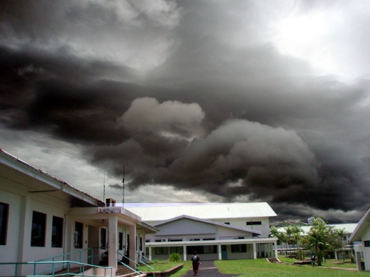 Artificially rebalanced clouds over the library associated with overhead cumulonimbus complex